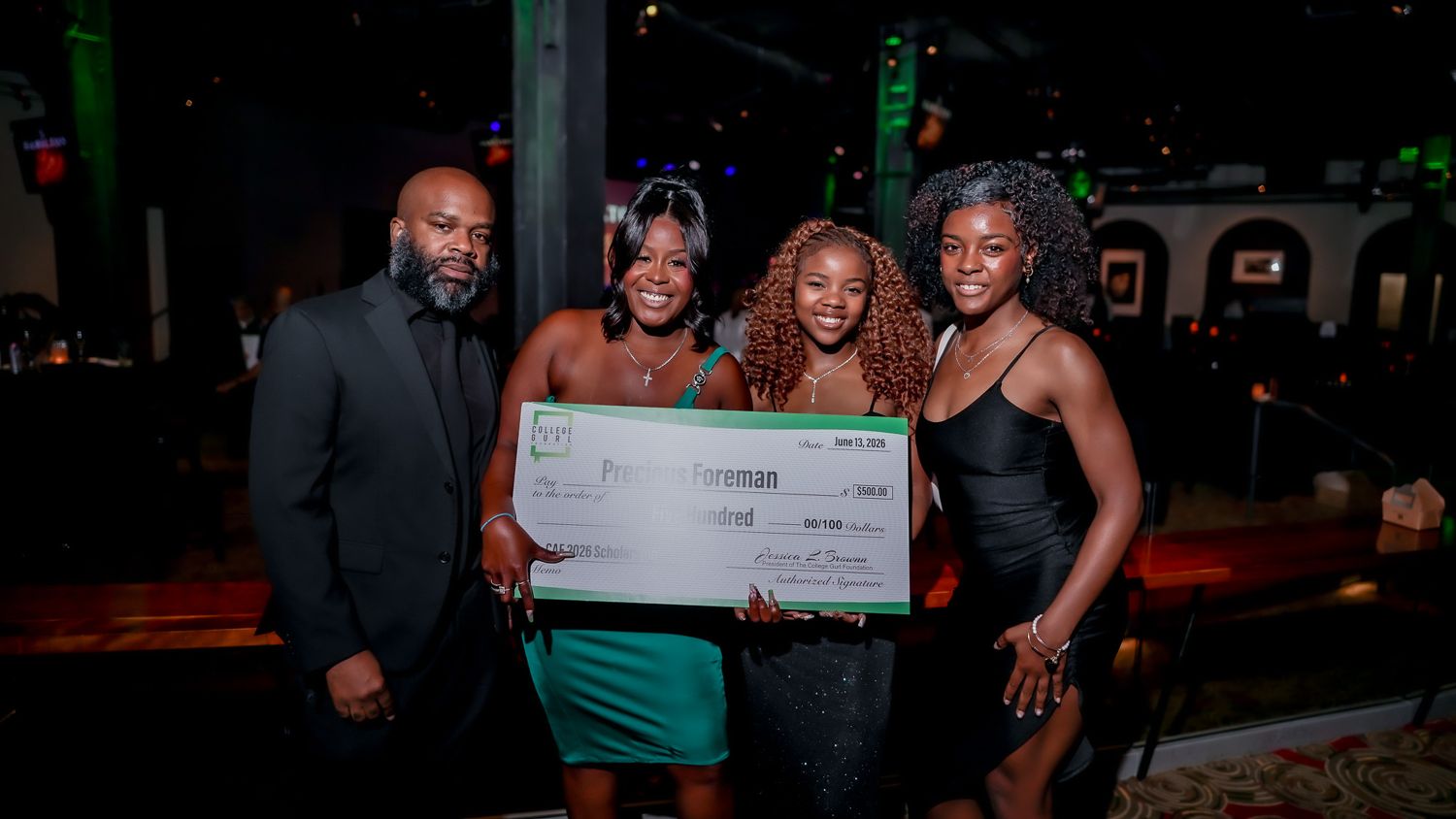 Jessica presenting a College Gurl Foundation scholarship